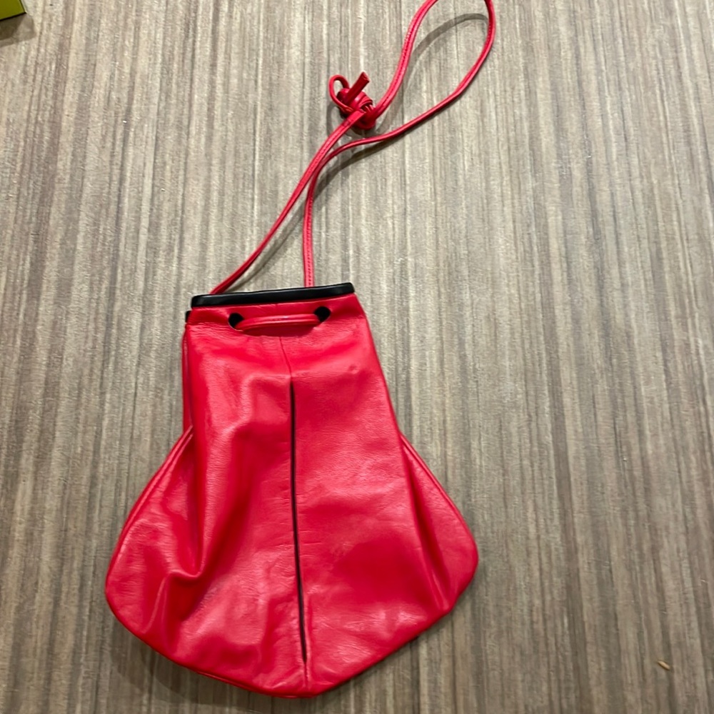 Red leather cinch bag